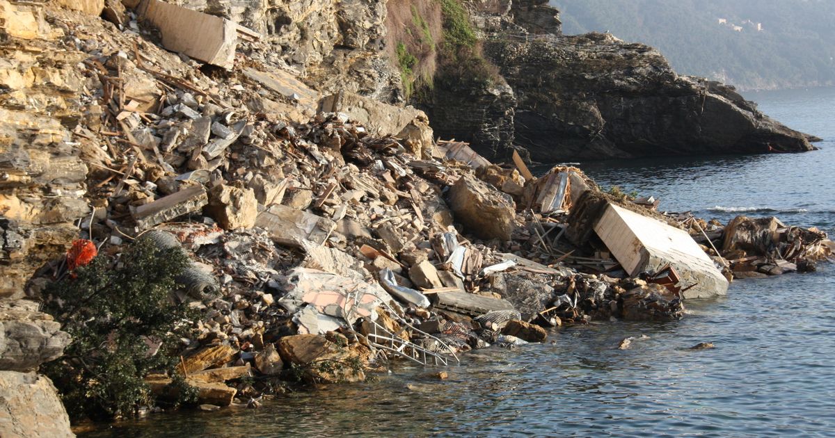 Seagulls feast on corpses after coffins crash into sea in grisly mayhem