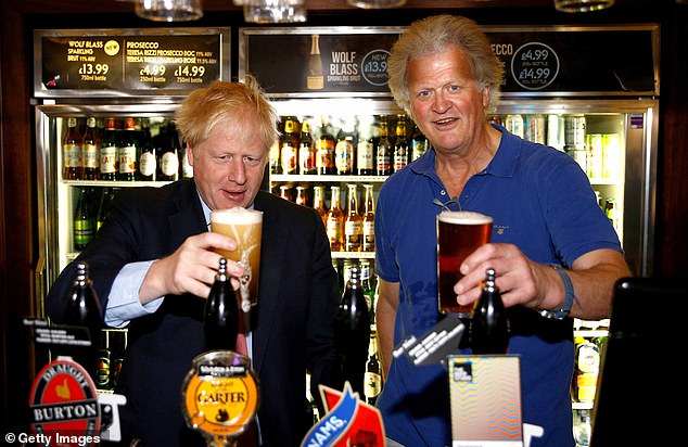 Cheers! Wetherspoons boss Tim Martin cashes in Â£50m of shares