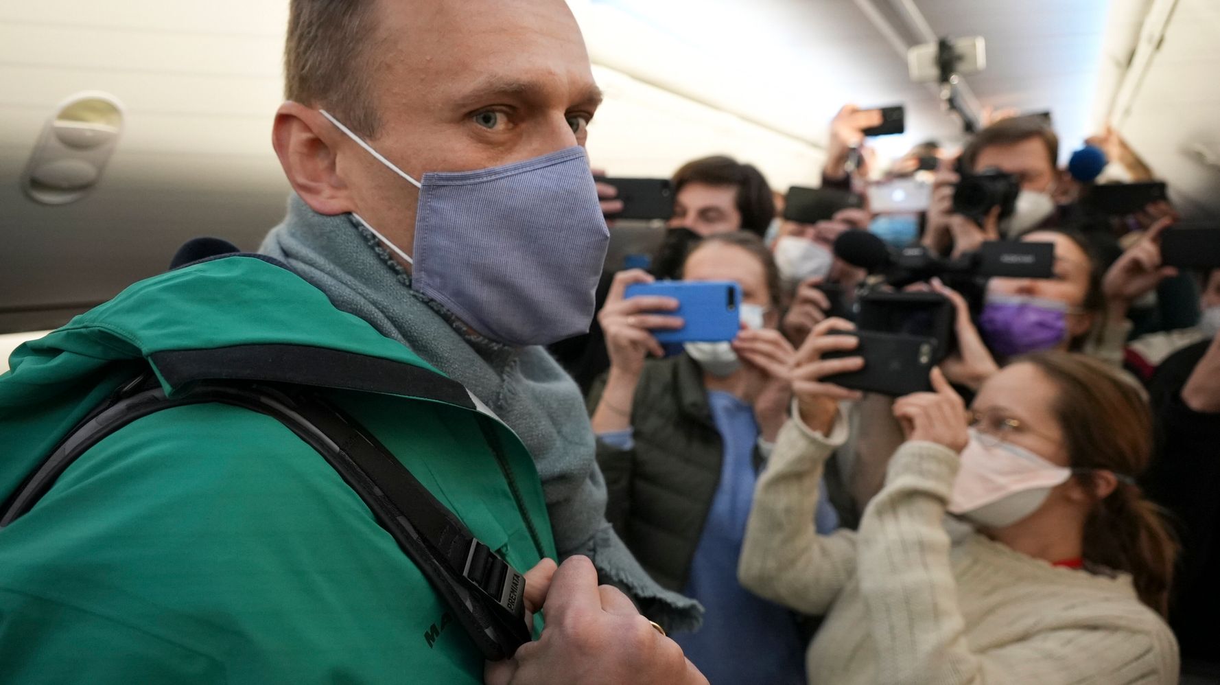 Putin Critic Alexei Navalny Detained After Landing In Russia