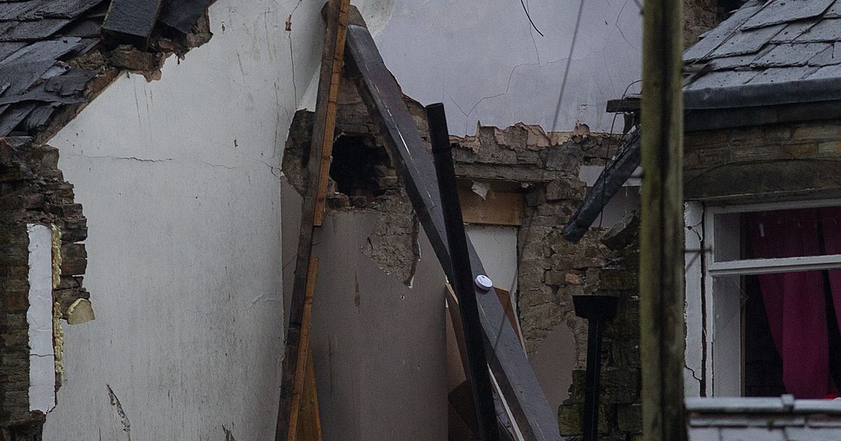 Bury explosion: Woman dead and five injured after house collapses