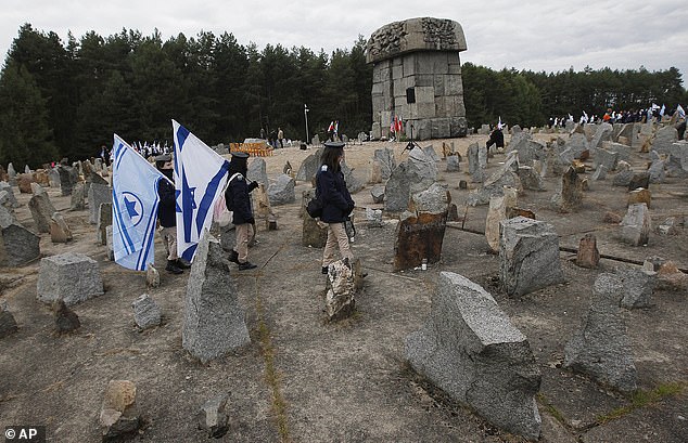 Polish court orders historians to apologise over Holocaust book