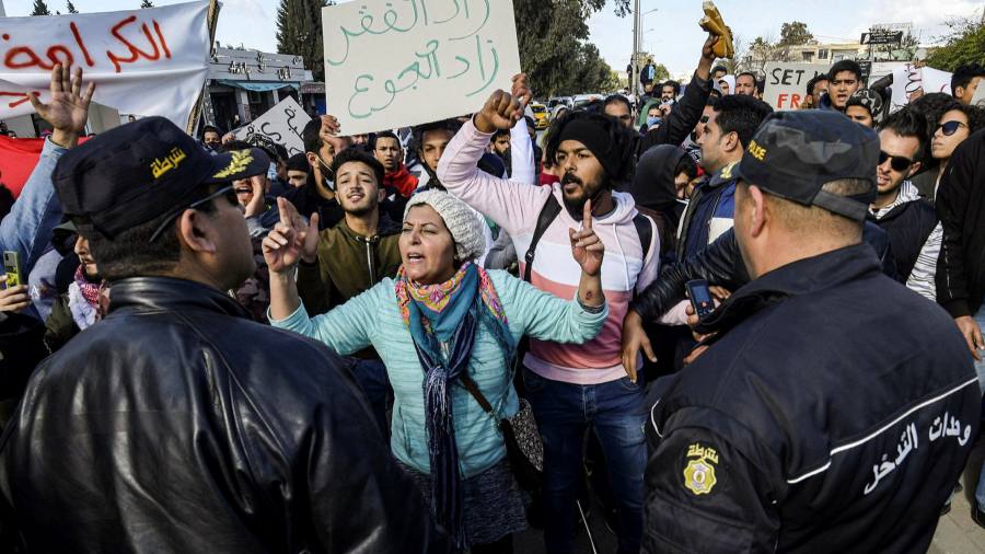 Tunisian parliament backs cabinet reshuffle as protesters take to streets