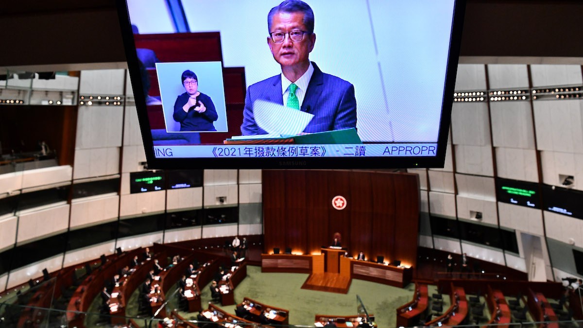 Hong Kongâ€™s budget criticized for halving handouts