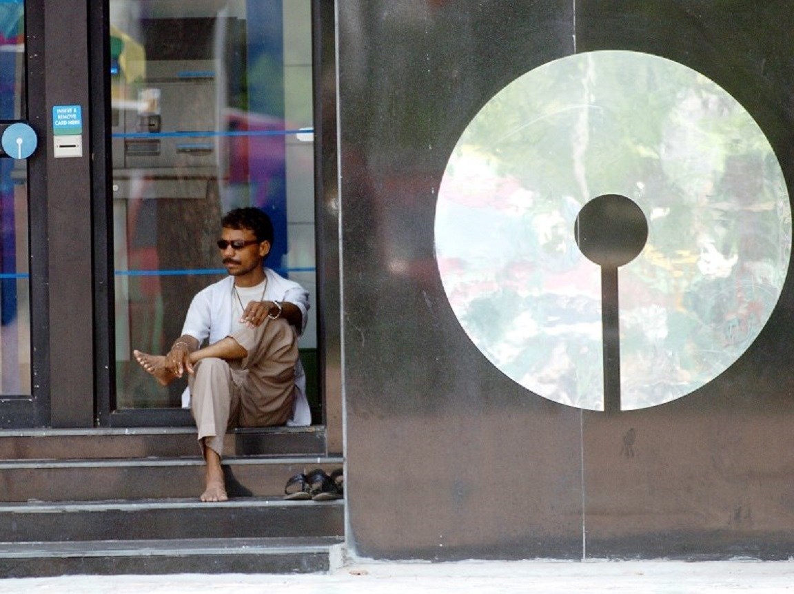 India’s SBI net down 7%, beats estimates