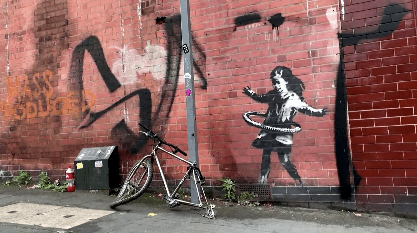 Banksyâ€™s Hula-Hooping Girl Has Been Removed and Sold