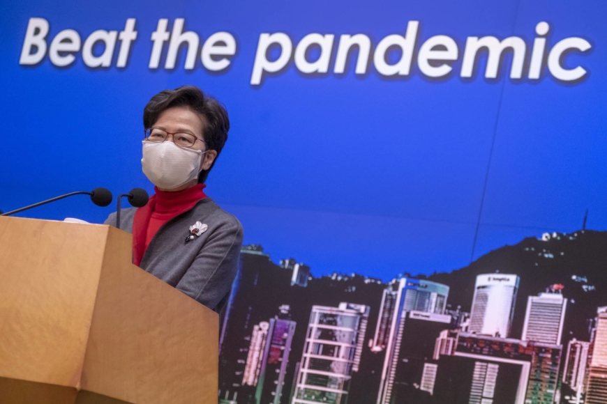 Hong Kong threatens to knock down doors to force COVID-19 tests