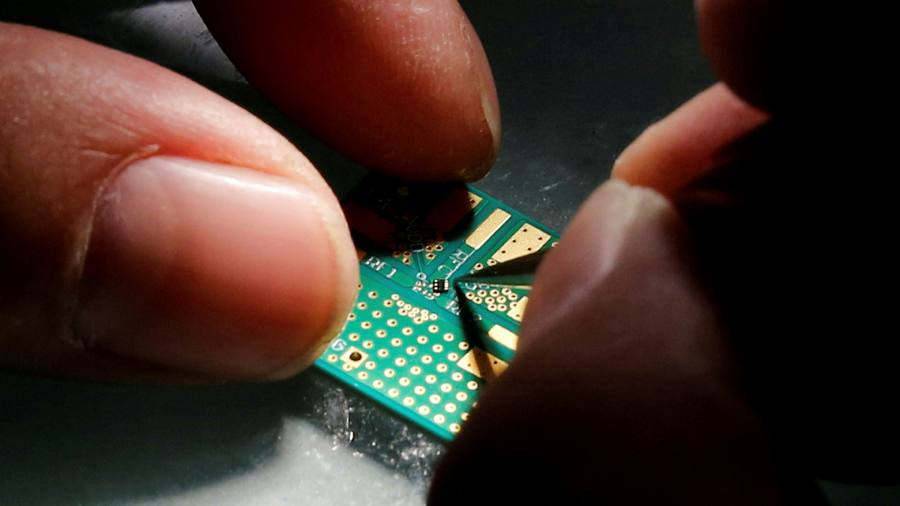 Global investors seek freeze on China chip championâ€™s foreign assets