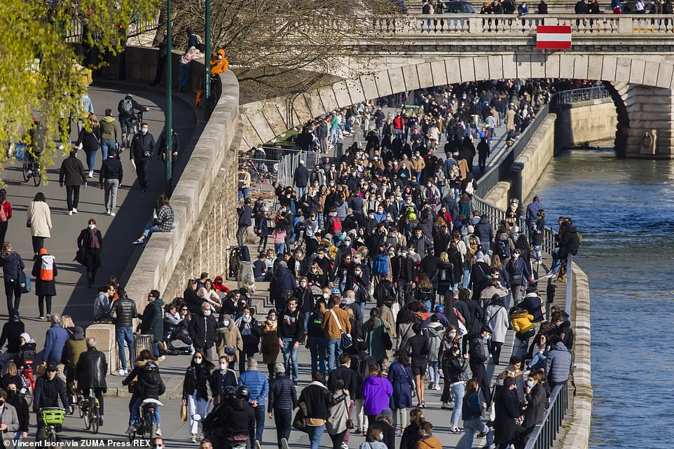 France Covid: Parisians enjoy sunshine as they flout lockdown rules