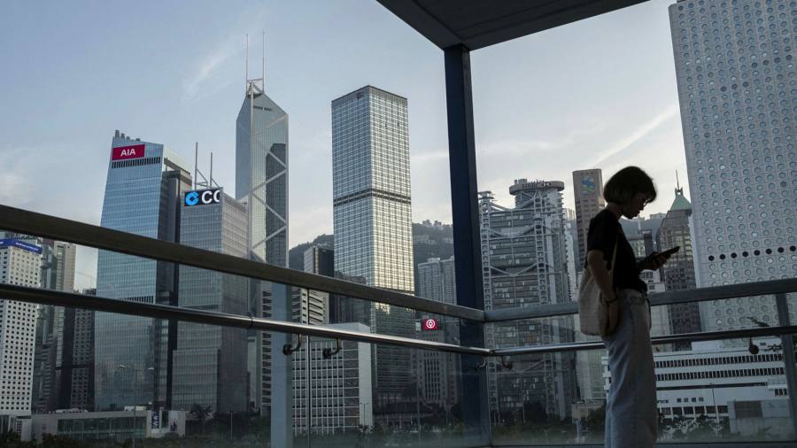 Hong Kong promises investors its prized tax haven status is secure