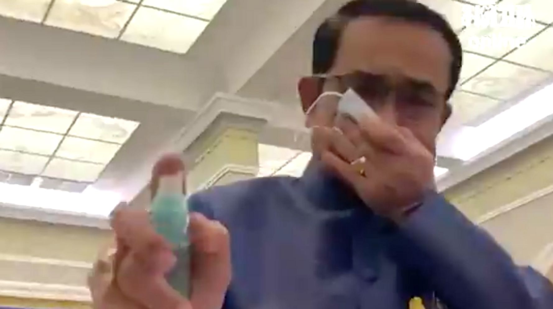 Thai Prime Minister Sprays Hand Sanitizer At Reporters