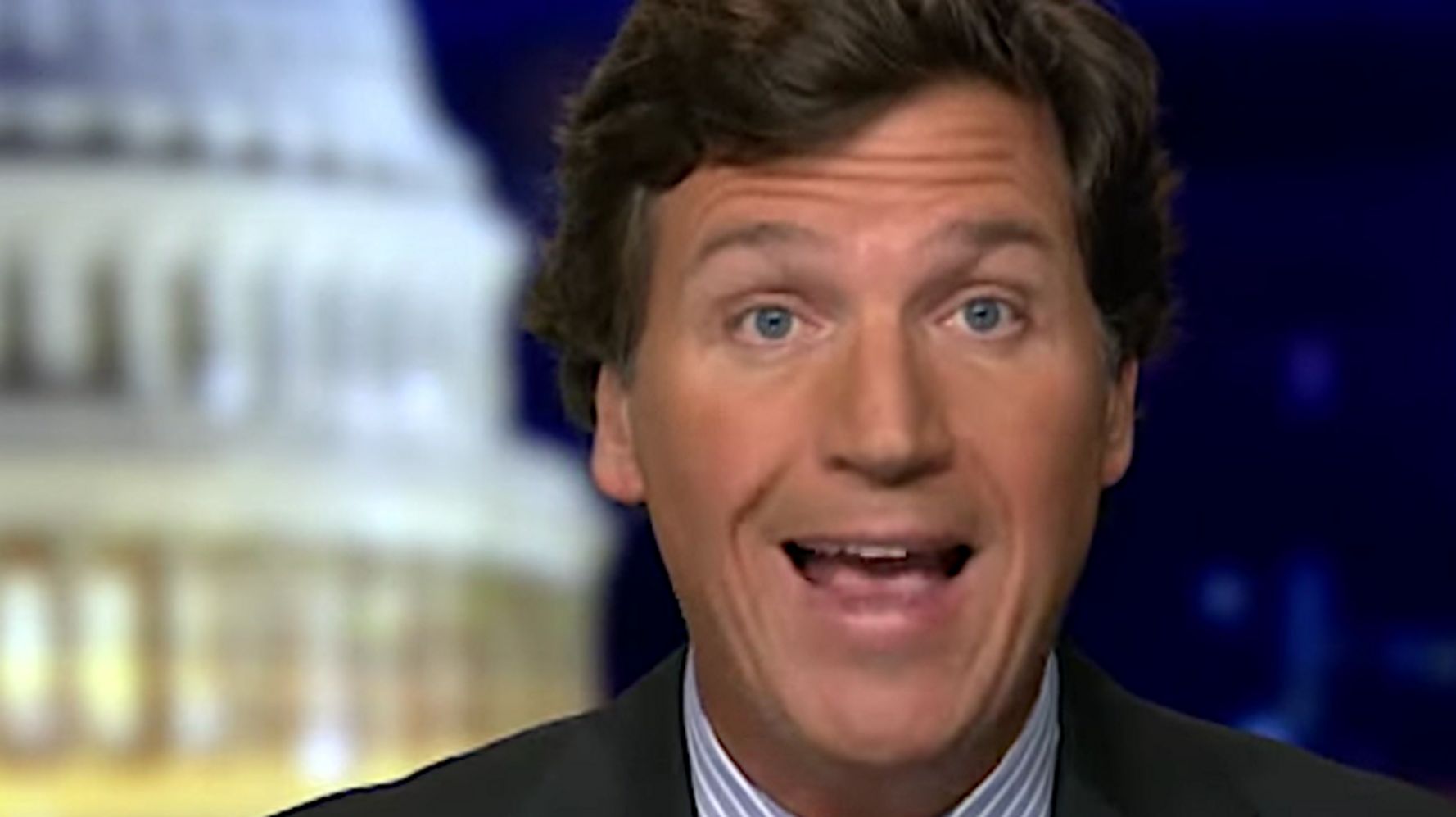 ‘Biden Should Be Finished,’ Fox News Chyron Says As Tucker Carlson Mugs During Speech