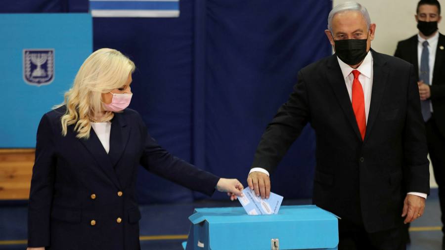 Netanyahu close to slim majority in Israel election, exit polls predict