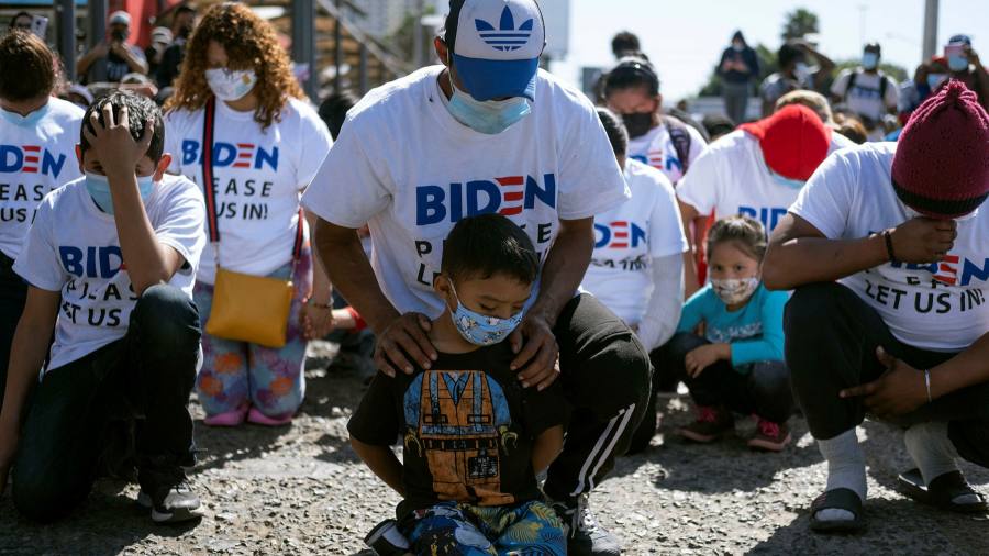 â€˜We have faith Biden will let us crossâ€™: migrants huddle at US-Mexico border