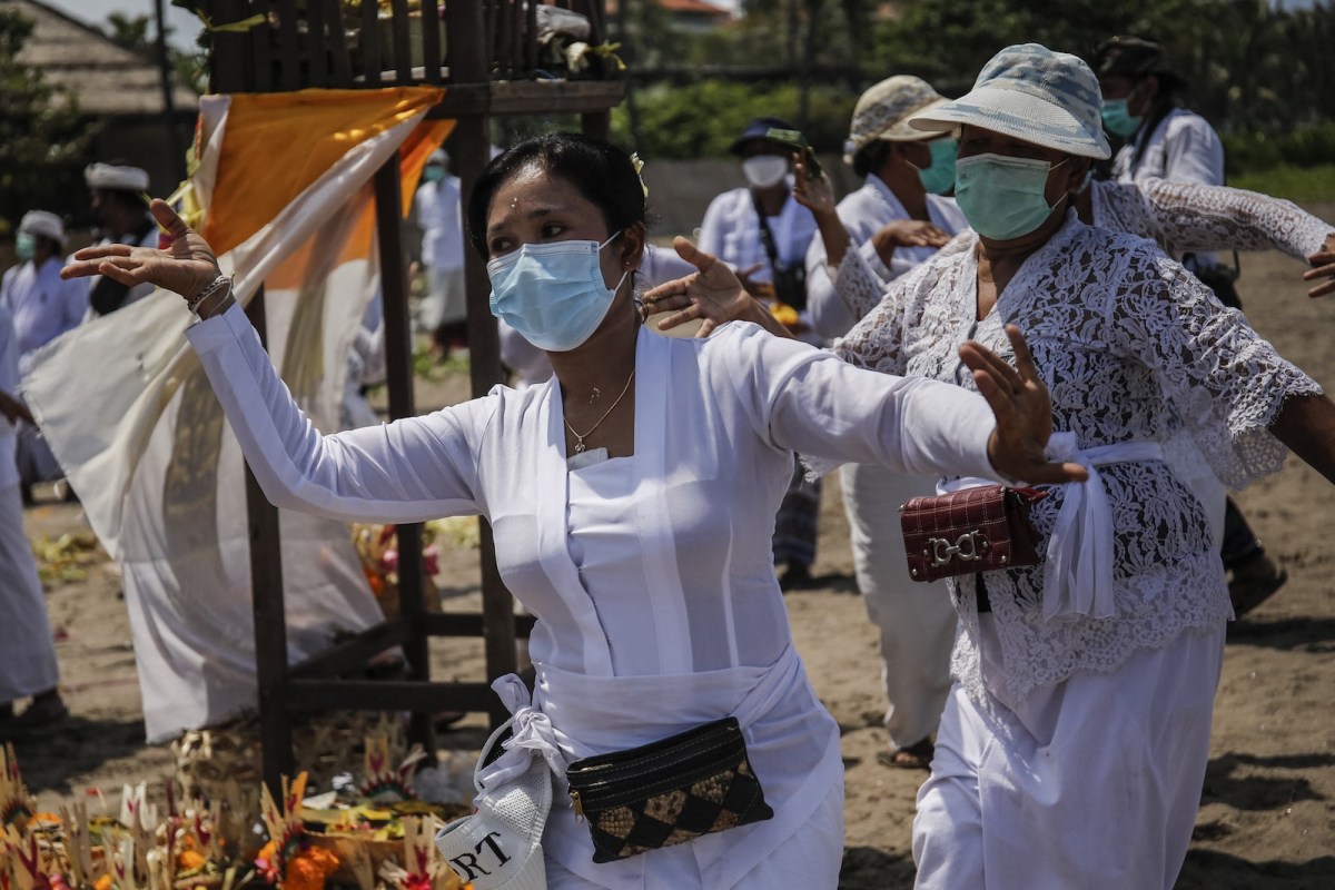 Bali hopes and prays for the tourists to return