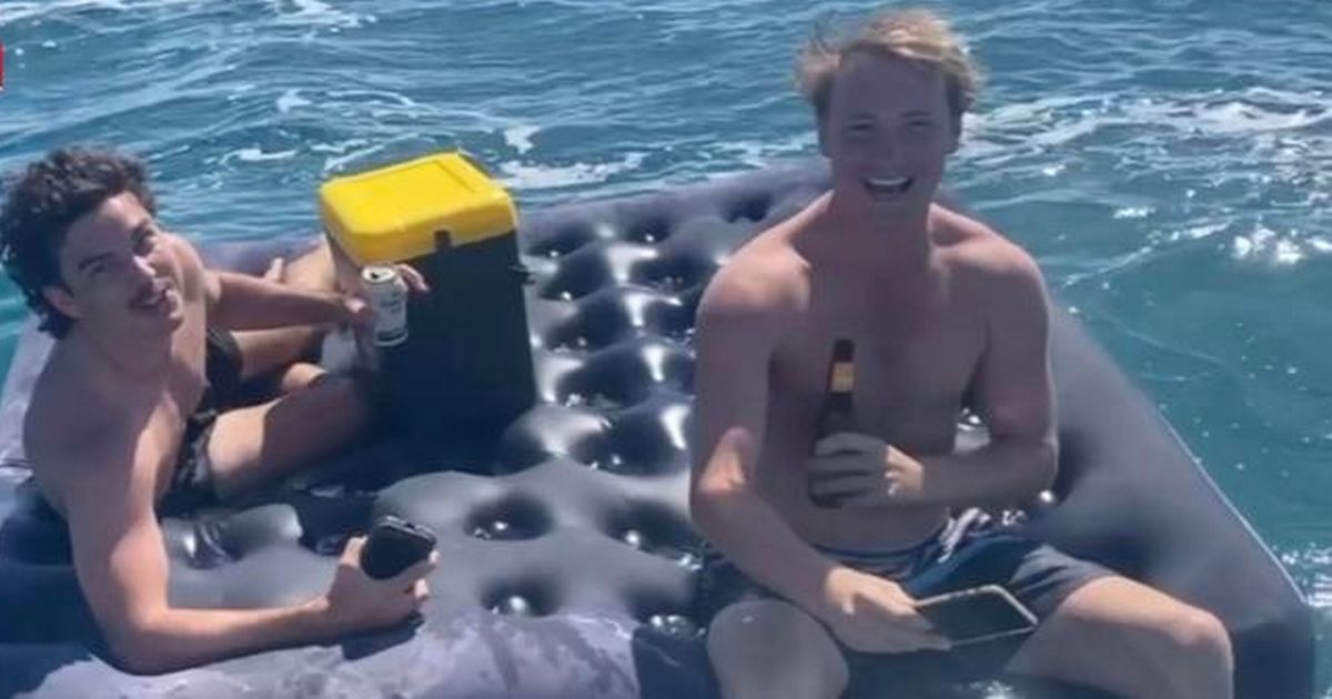 Lads rescued after floating out to sea on blow-up mattress with crate full of booze