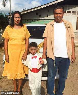 Five-year-old Thai twins get MARRIED because their Buddhist parents believe they were lovers