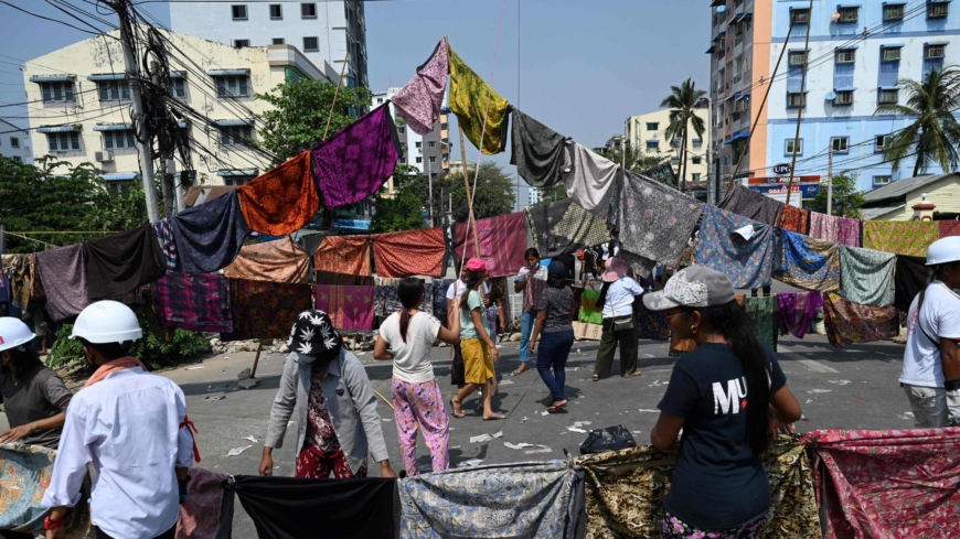 Superstitions about women’s clothes help protesters skirt Myanmar’s junta